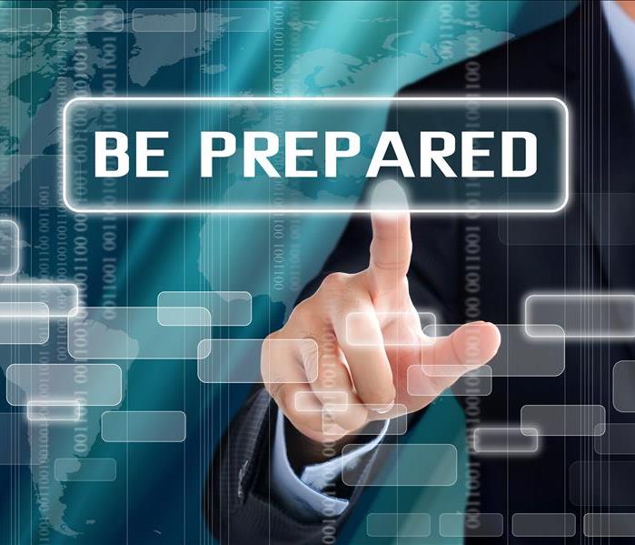 Finger pointing at "Be Prepared" text.